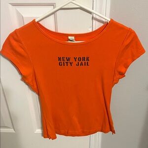 Kavio Orange 'New York City Jail' Short Sleeve Graphic Tee